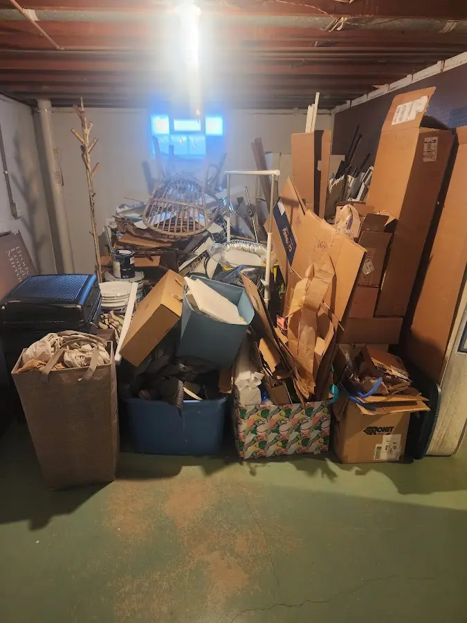 Roll-off dumpster container at job site for 20 Yard Dumpster Rental in Carver